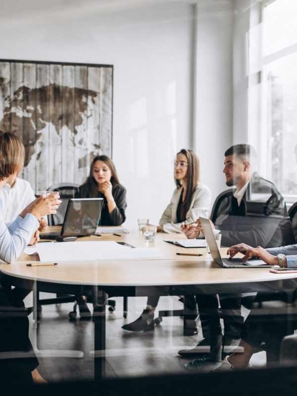 group-people-working-out-business-plan-office